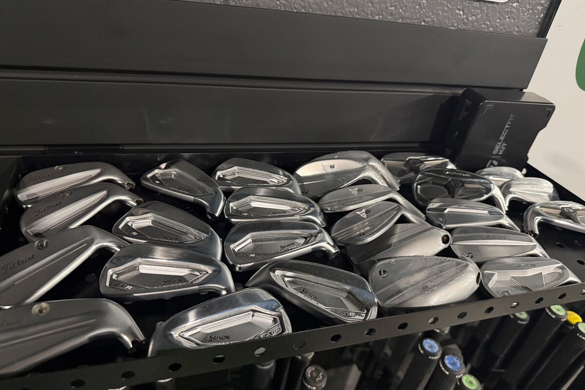 A tray of loose iron and wedge heads, waiting to be matched to a shaft.