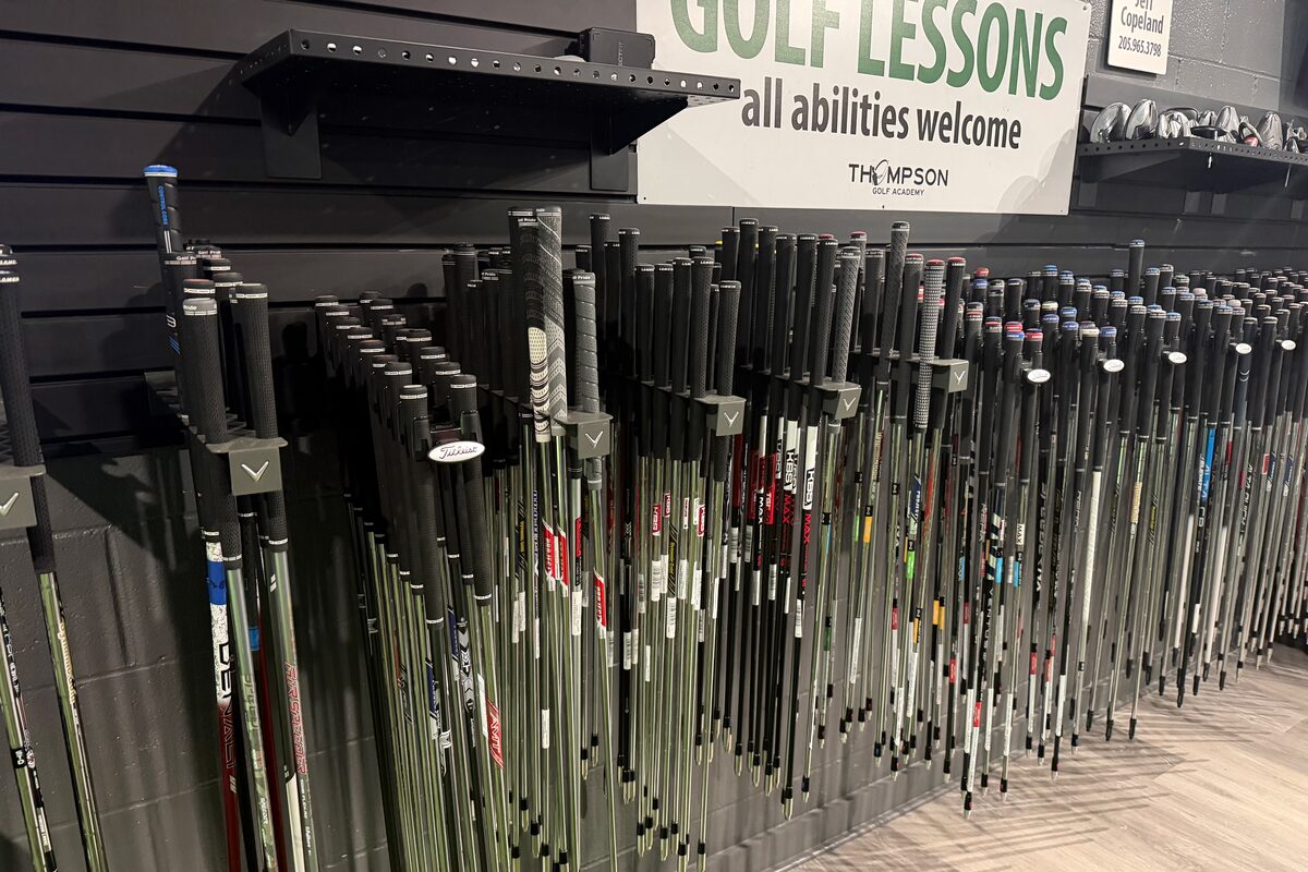 The fitting rack: several hundred shafts standing on the wall, labelled by model and flex.