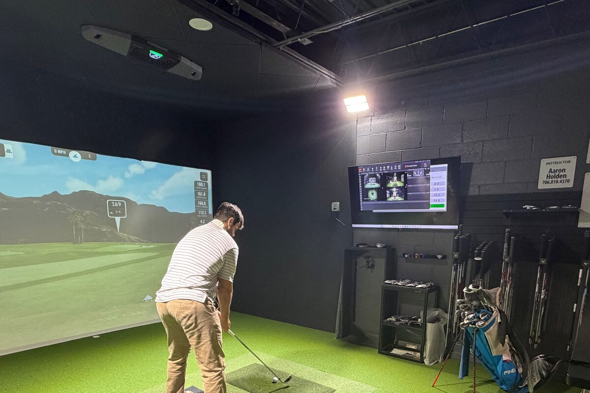 A bay in use: the Foresight unit mounted on the ceiling at the left, and nothing on the floor beside the hitting mat.